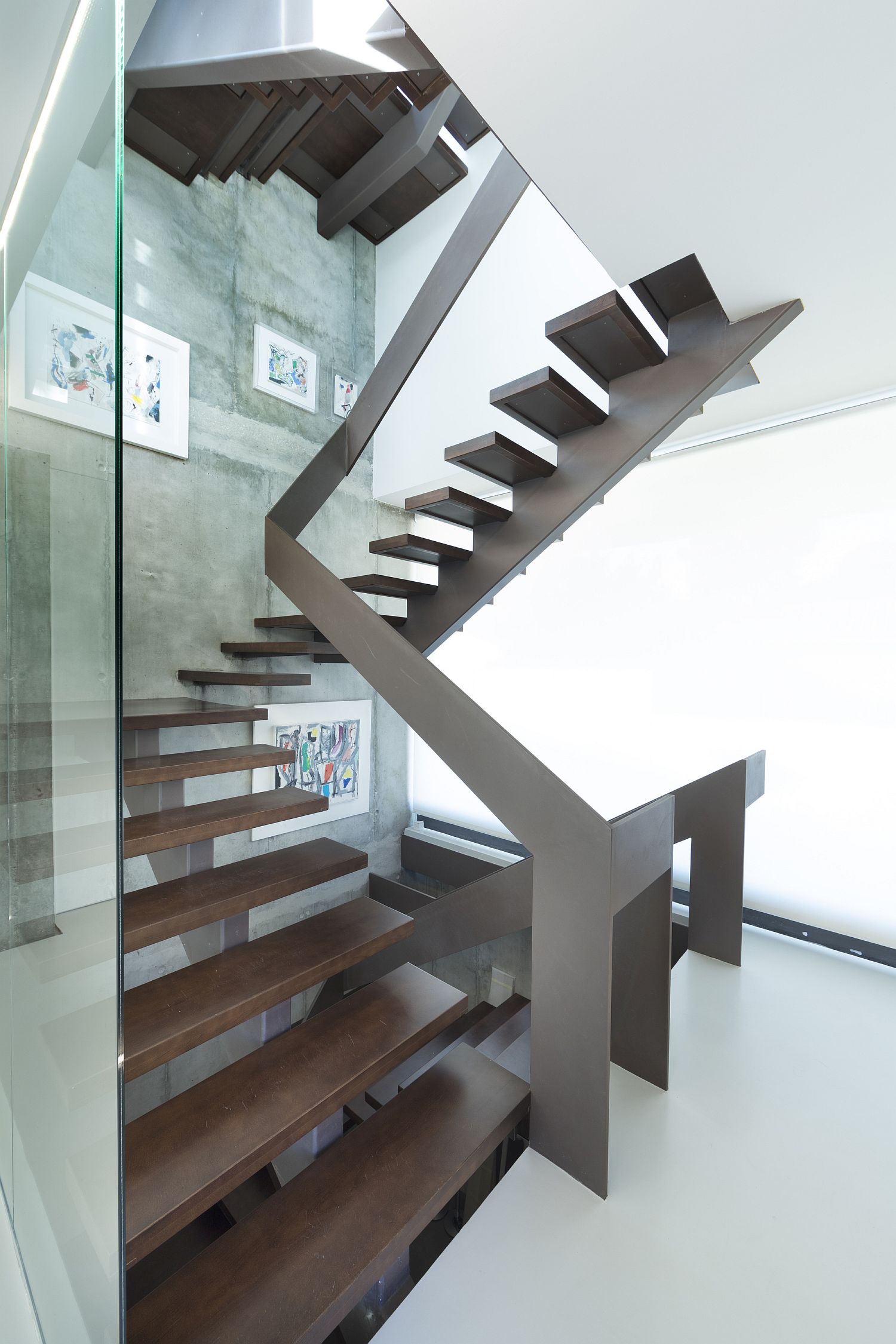 Glass and wood sculptural staircase for the modern home