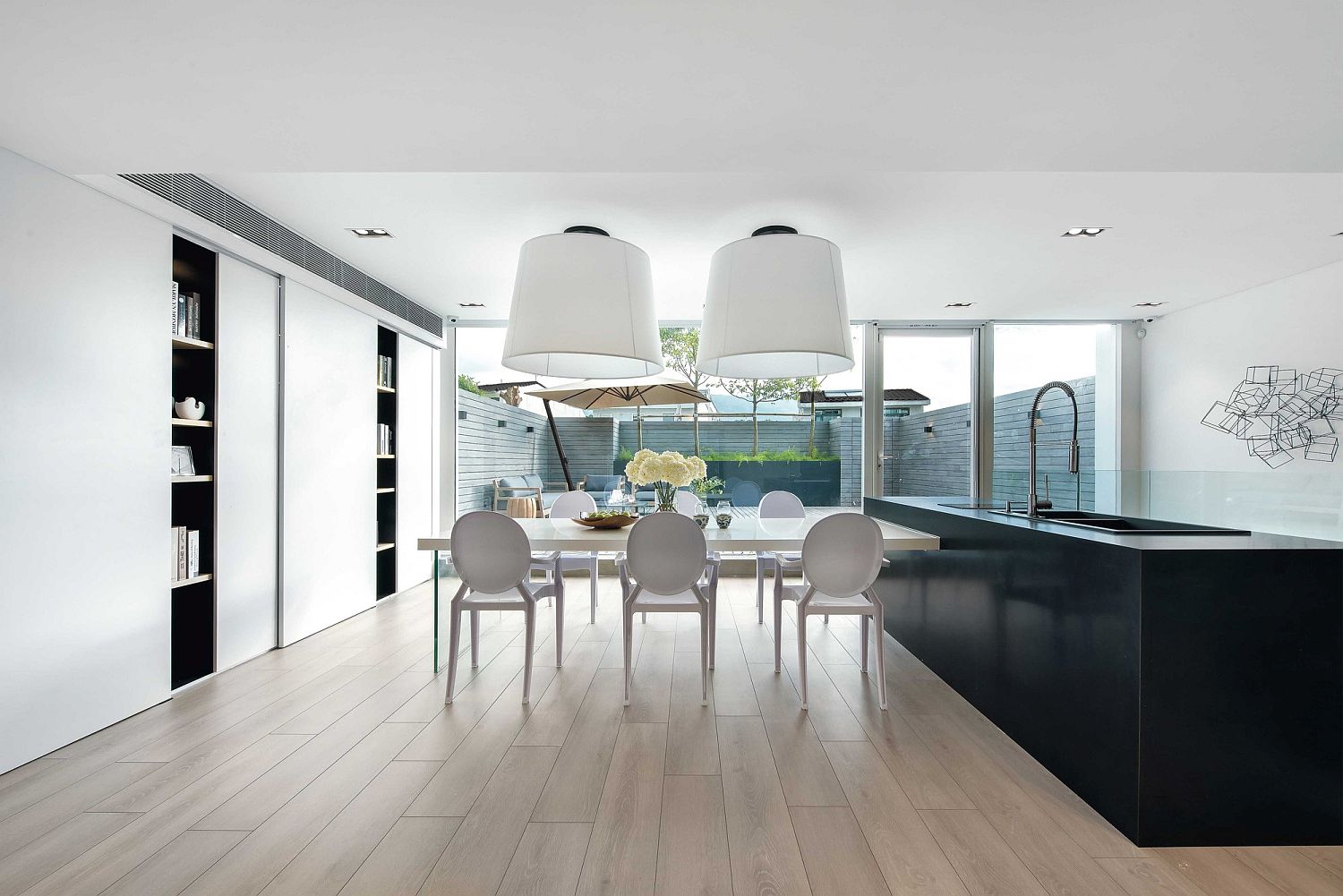 Kitchen and dining space of the contemporary home in Hong Kong
