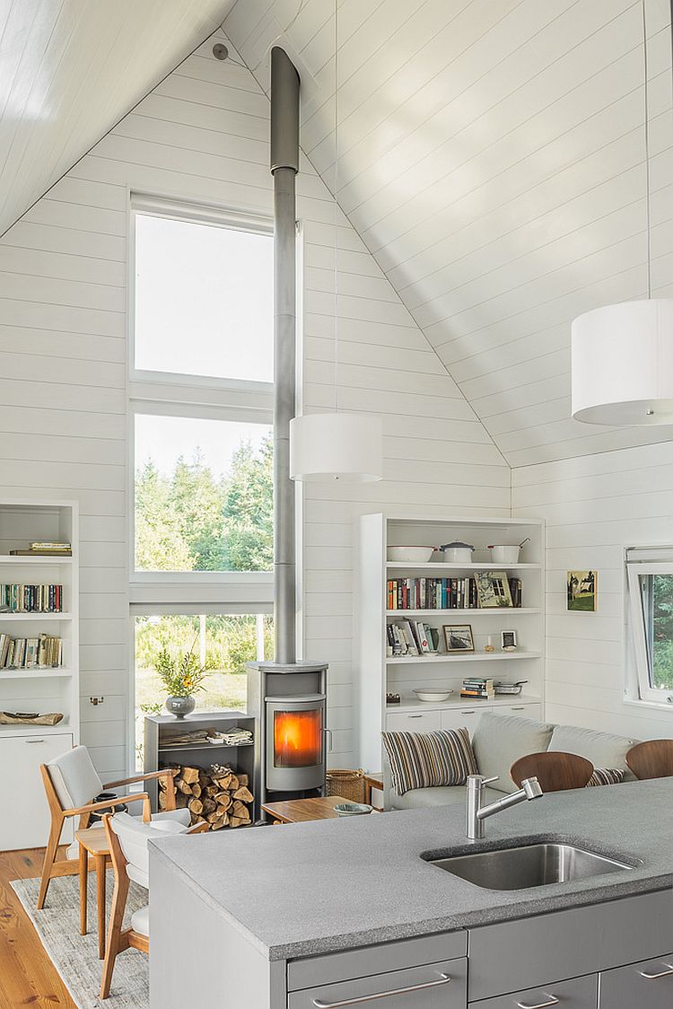 Living area with gable roof and an interior in white