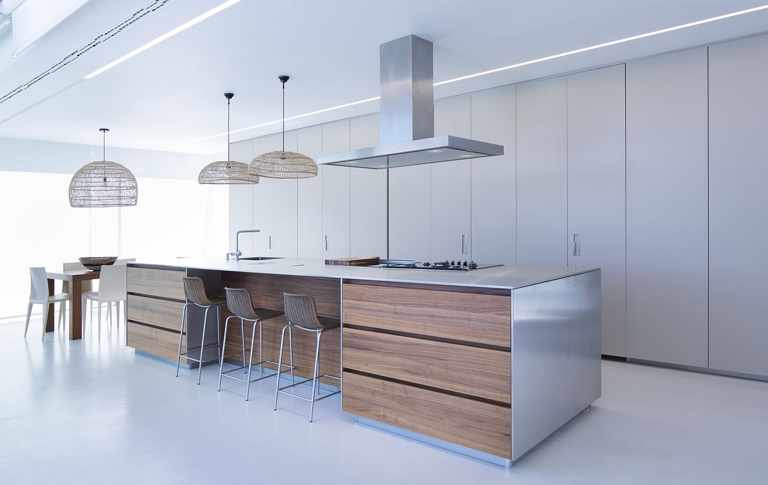 Lovely use of large pendants for kitchen and dining area