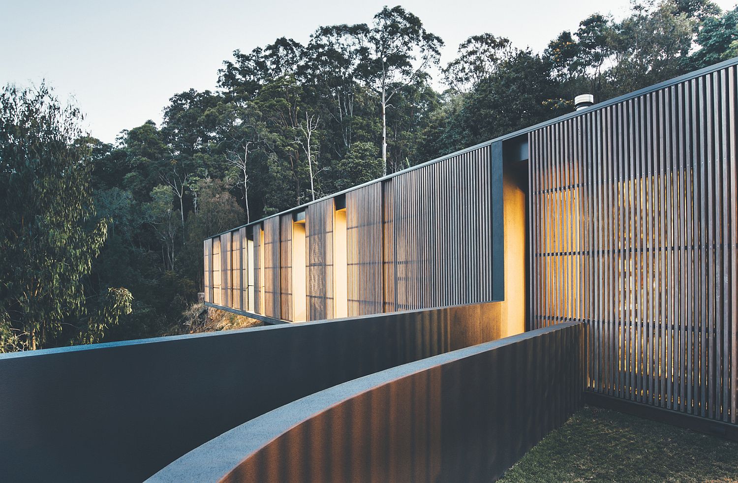 Lovely use of slats provides a balance between ventilation and privacy