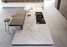 Marble-kitchen-island-countertop-along-with-wooden-breakfast-bar-217x155