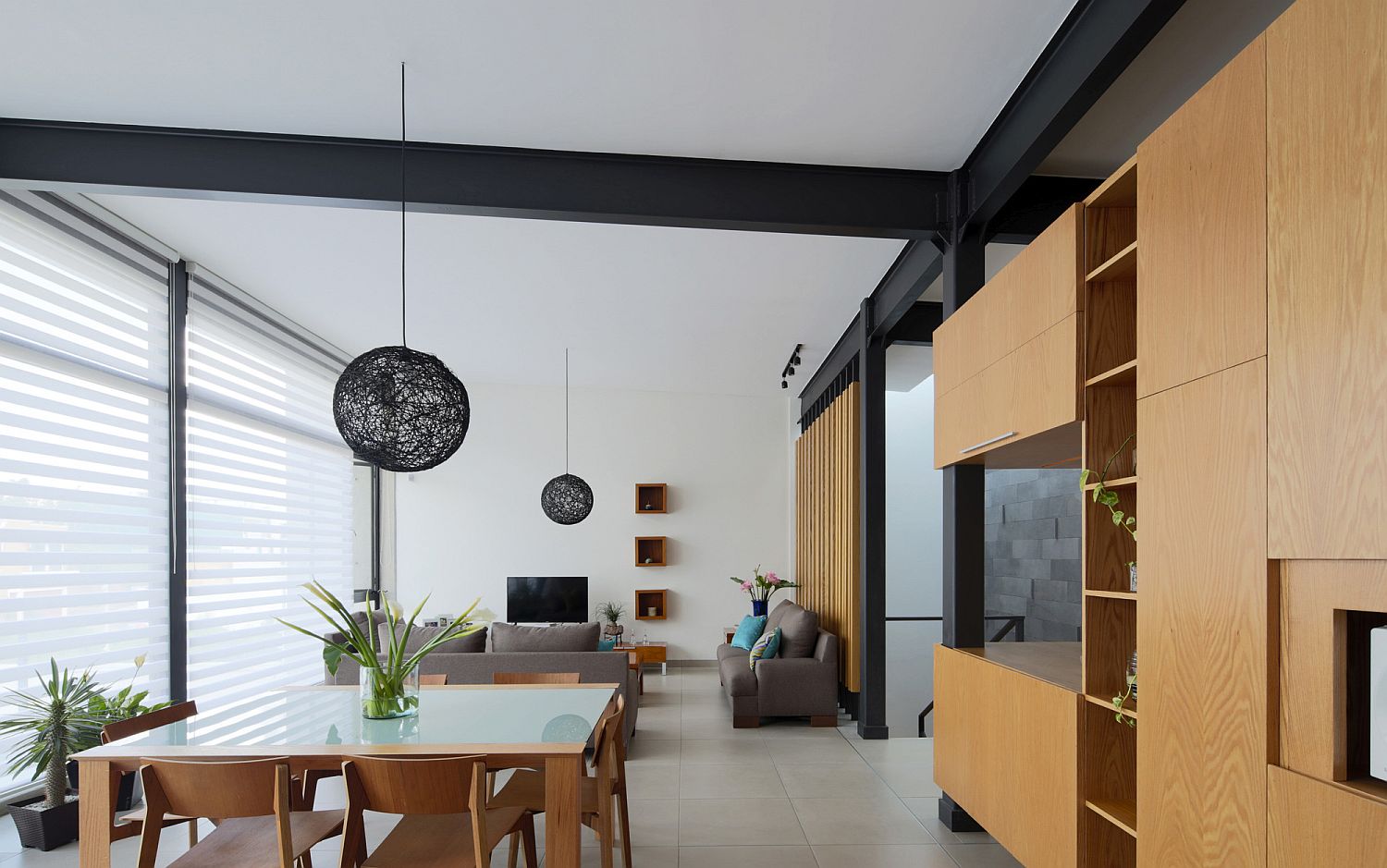 Open plan living area of Casa Milán that is lit up in natural light