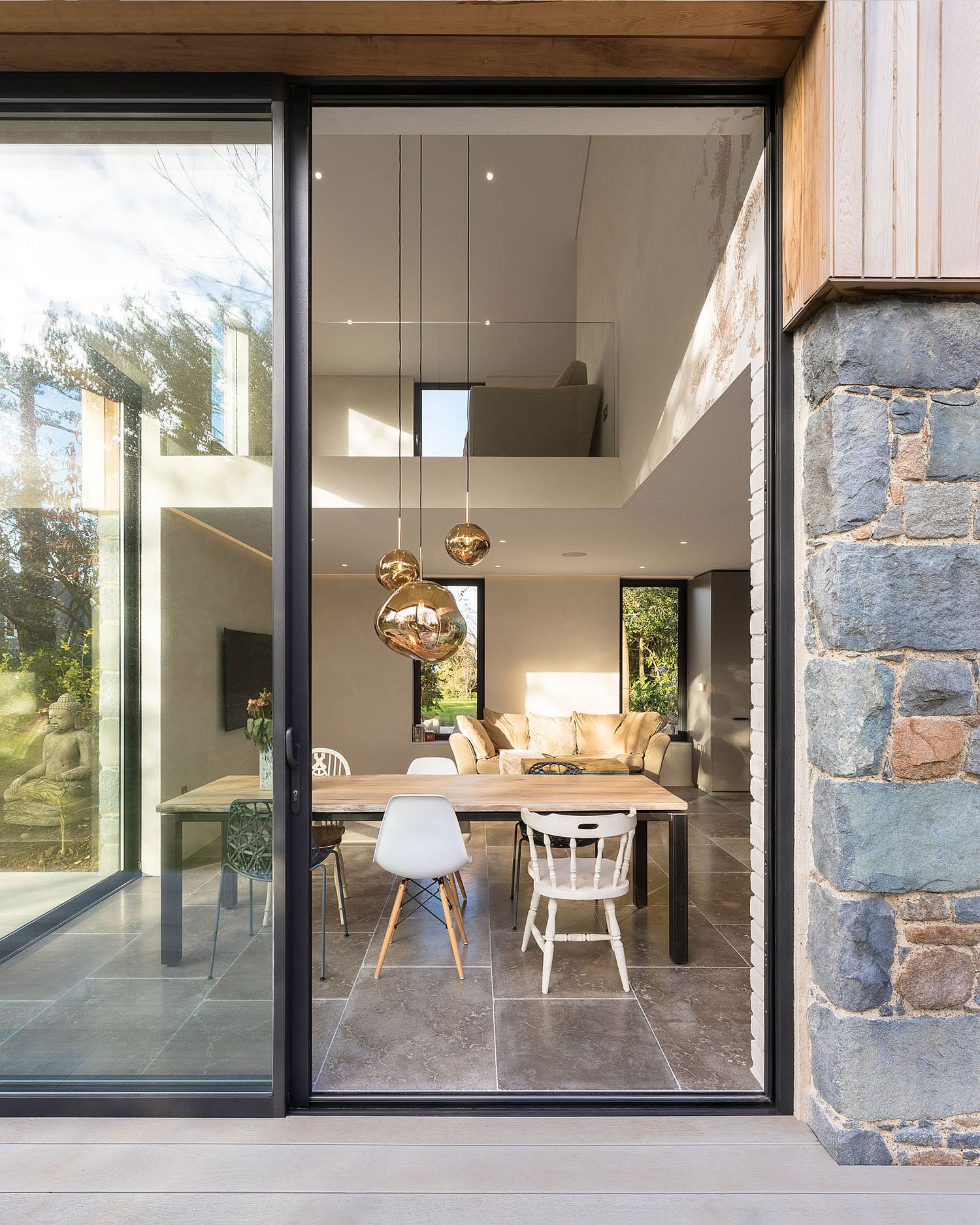 Sliding glass doors create an easy indoor-outdoor interplay