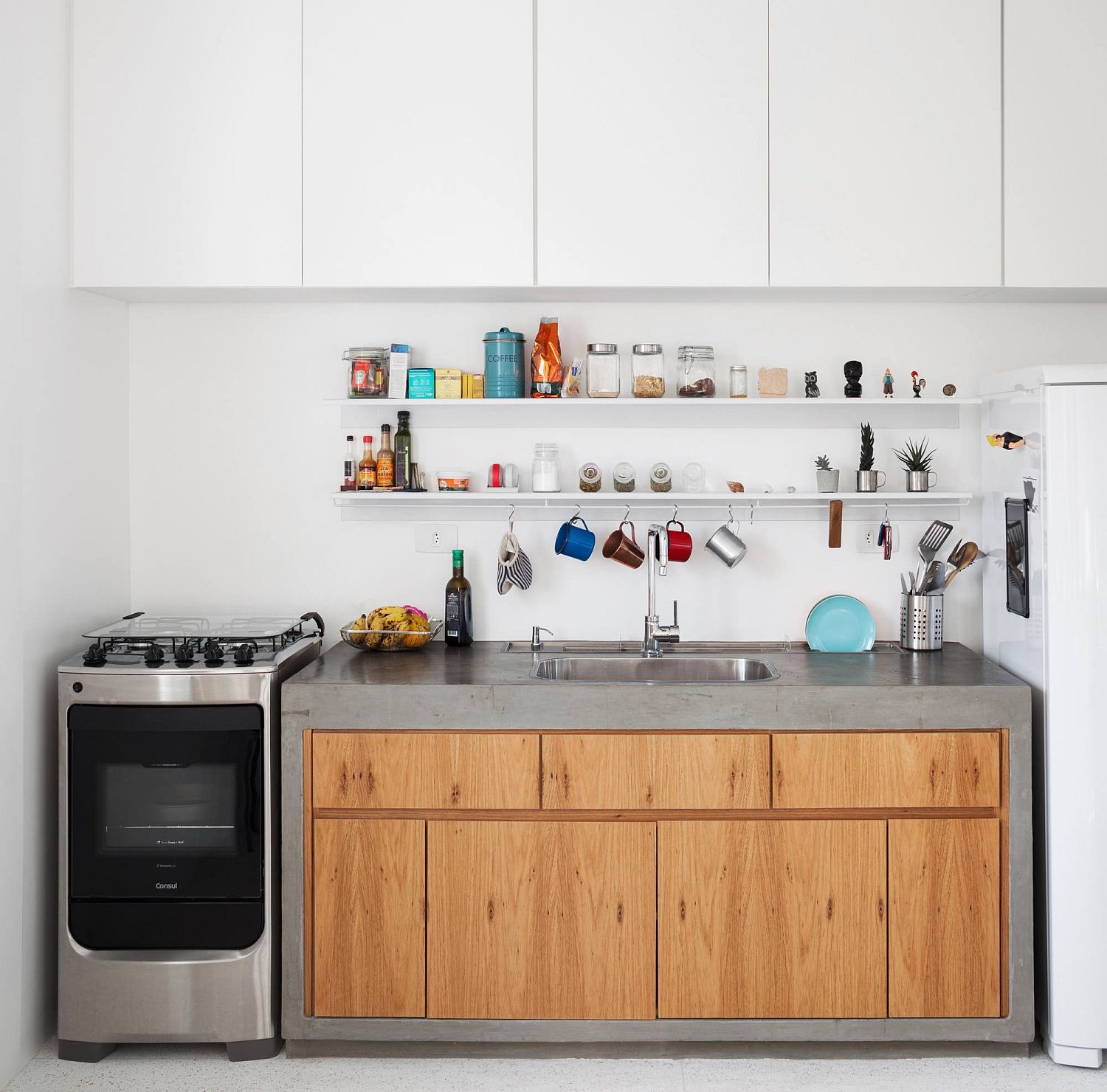 Small-single-wall-kitchen-design-with-a-multitasking-workstation