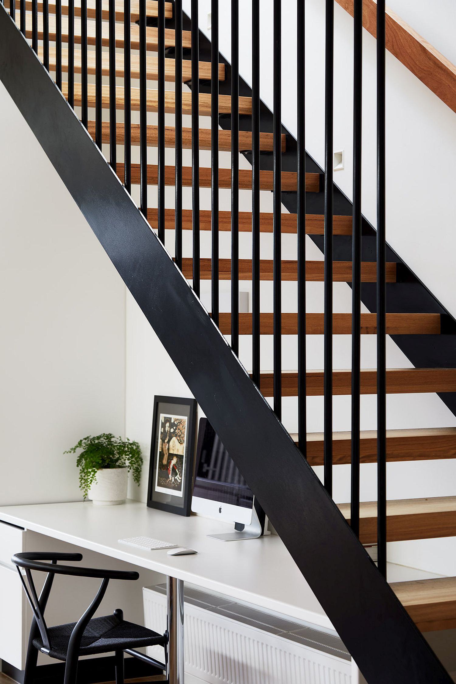 Wood-and-metal-staircase-inside-the-mdoern-Edwardian-house