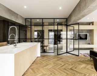 Revolving Door, Glass Walls and Diverse Textures: Revamped Condo in Tokyo