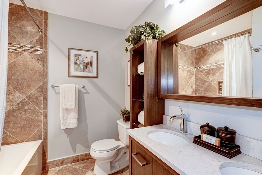 Box-style mirror frame used in the bathroom blends in with the box-style shelves next to it