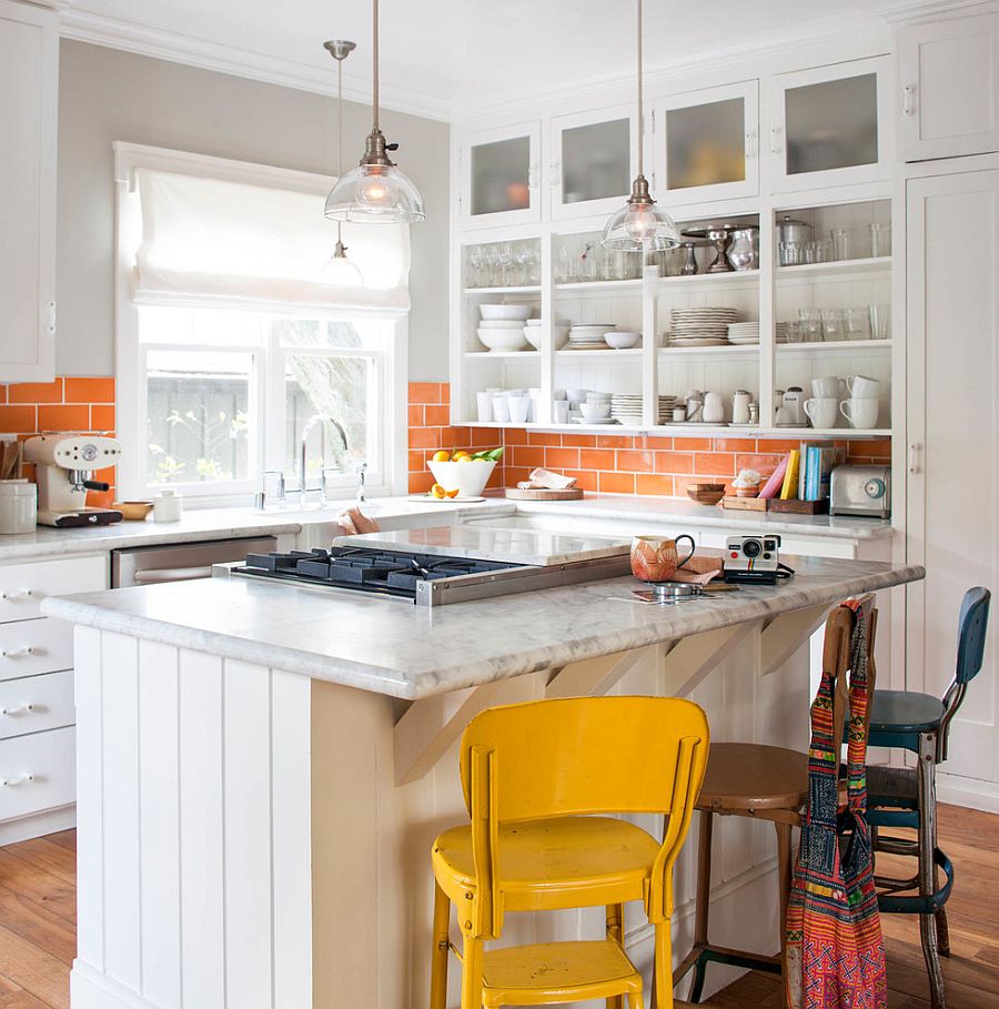 Cheerful modern kitchen in white with a smart tiled, orange backsplash