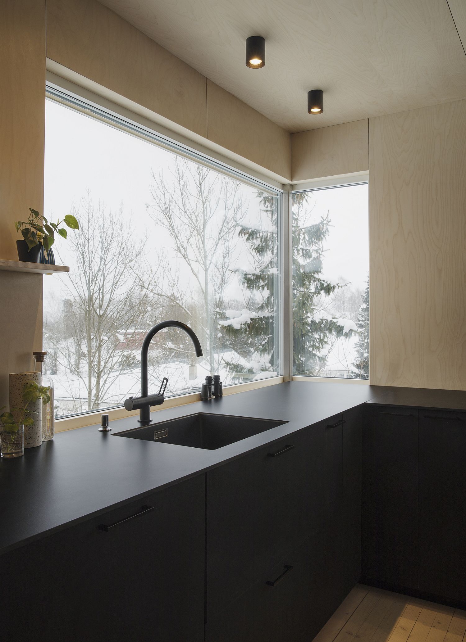 Corner window in the kitchen brings in ample natural light