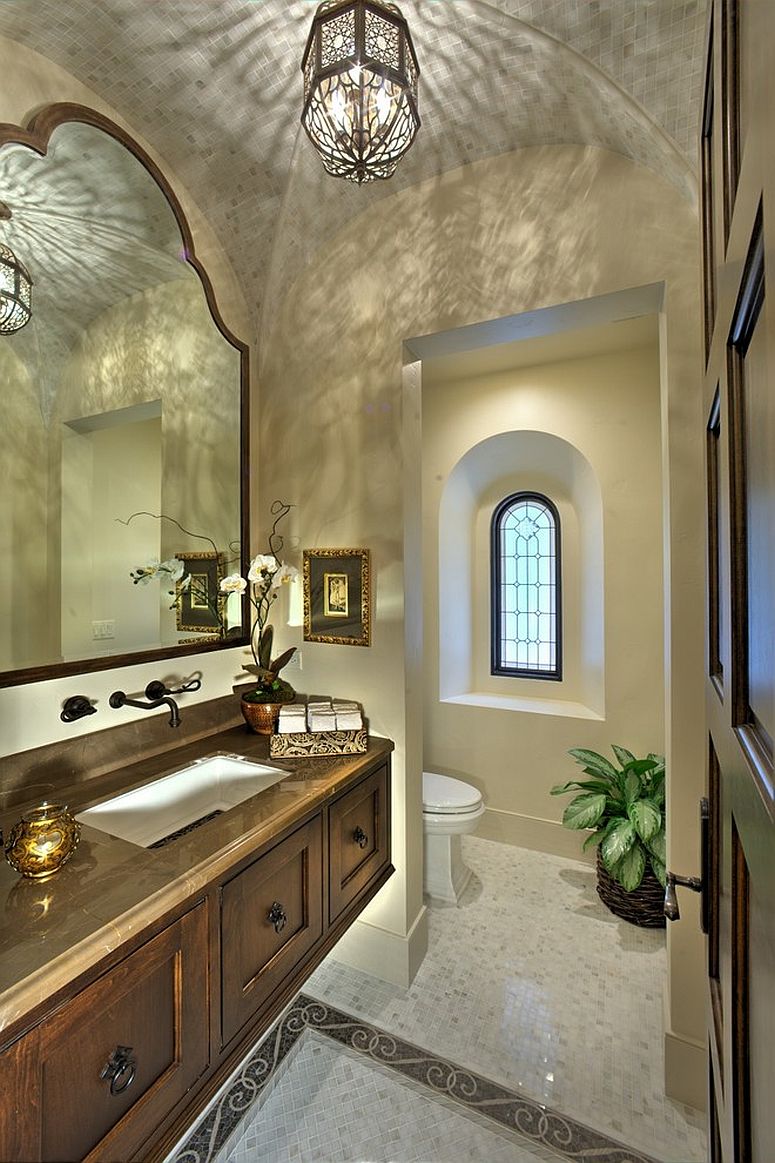 Curved ceiling and custom Moroccan lighting for the Mediterranean powder room