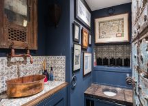 Fabulous-Meditrranean-powder-room-in-blue-with-a-custom-metallic-sink-and-antique-shelf-doors-217x155
