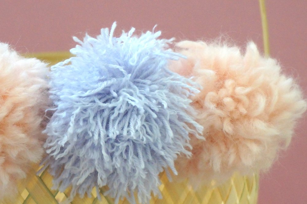 Fray your pom poms for extra texture