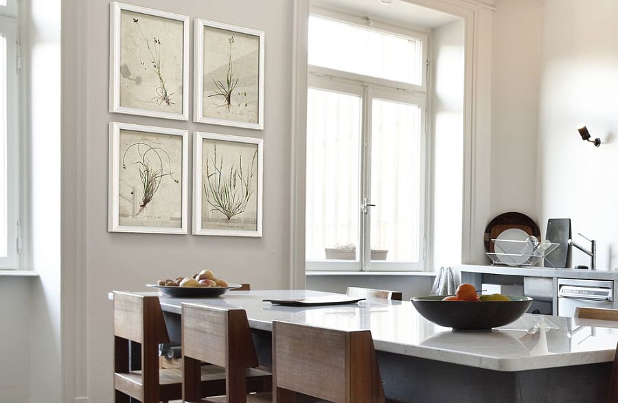 Lovely framed botanicals in the contemporary kitchen replace traditional art