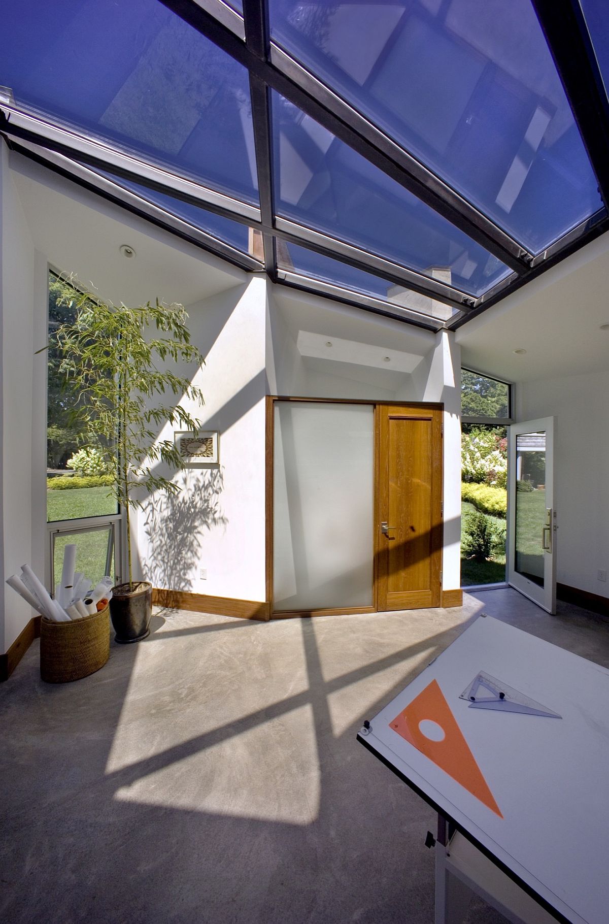 Metal frame and glass roof bring in ample ventilation