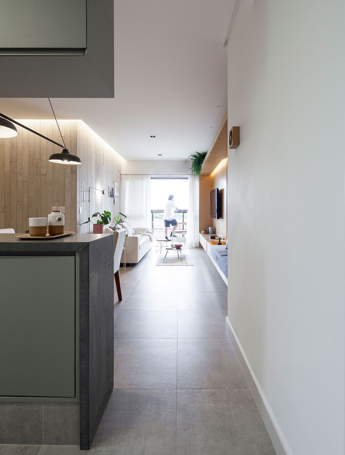 Open plan living area, kitchen and dining of the Brazilian apartment