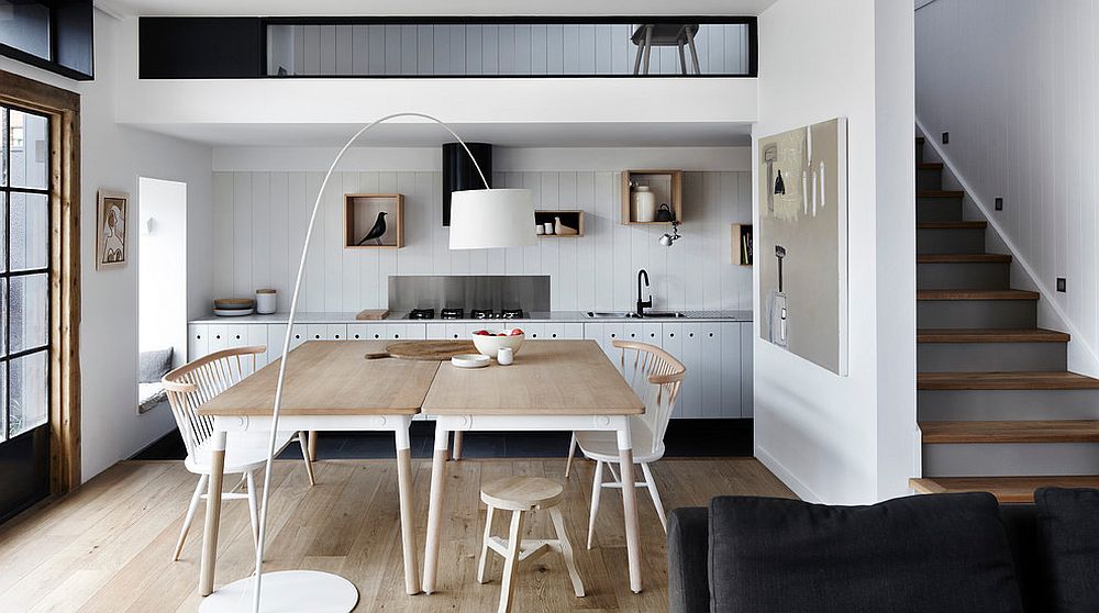 Small mezzanine with a single-wall kitchen below for the elegant Scandinavian home