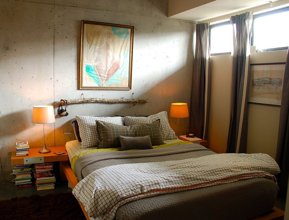 Windows-bring-the-right-amount-of-light-into-the-bedroom-with-concrete-walls