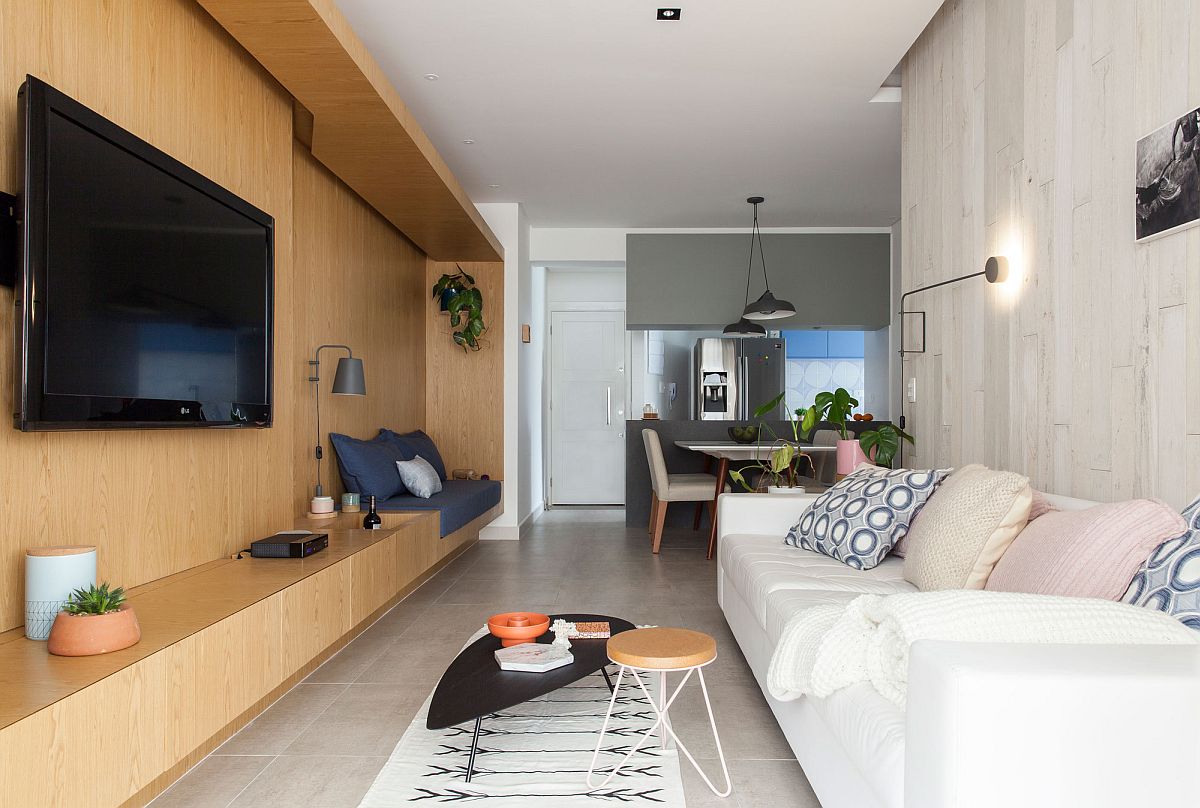 Wooden wall in the living room makes a bold visual impact