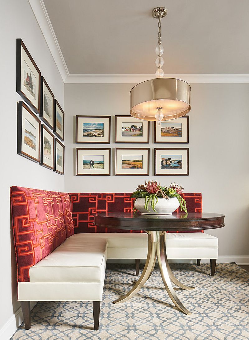 Bright-red-couch-and-a-curated-gallery-wall-for-the-banquette-style-dining
