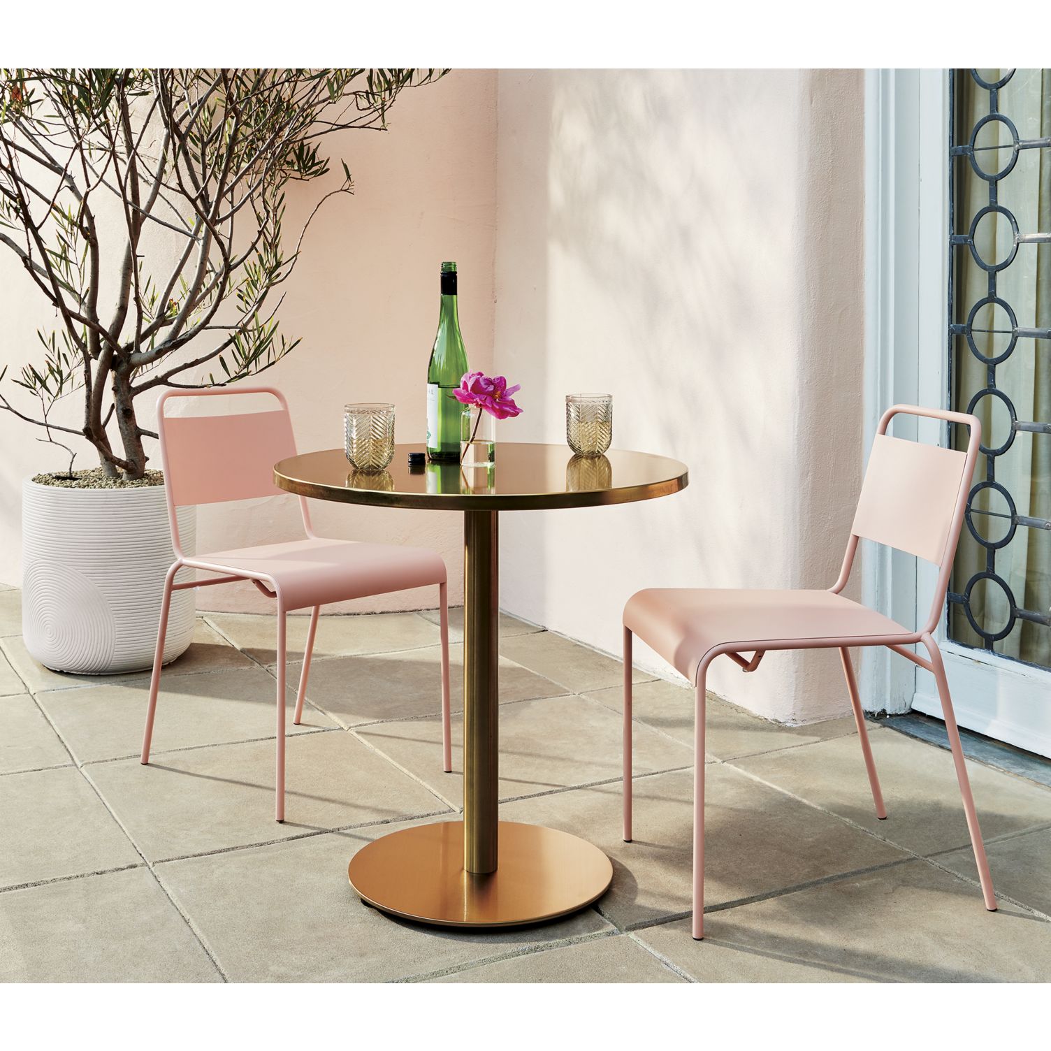Outdoor chairs in a shade of blush