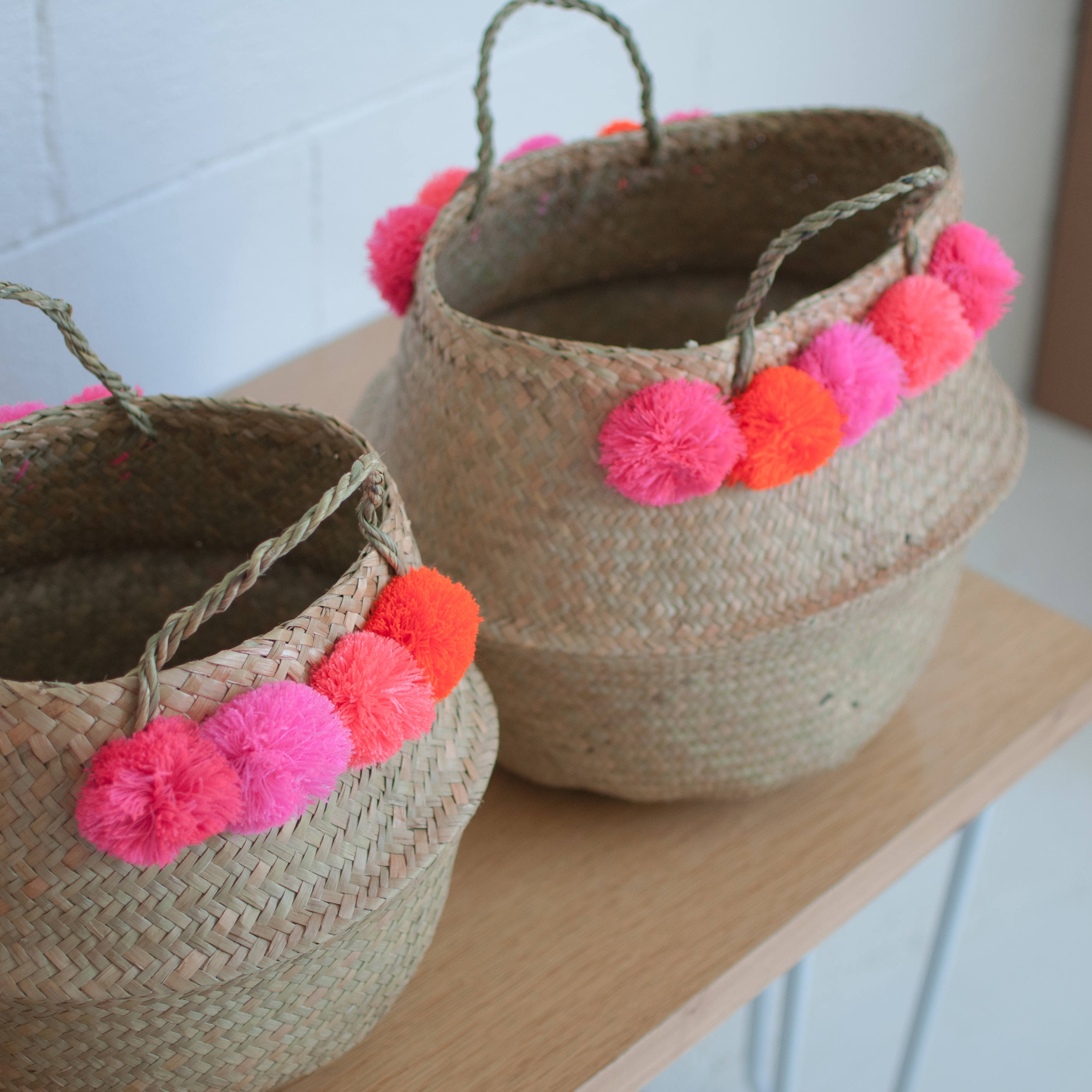 Seagrass-baskets-with-pom-poms