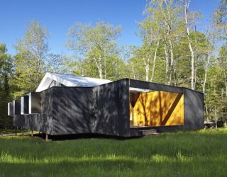 Adaptable Weekend Getaway Filled with Wood and Wonder!