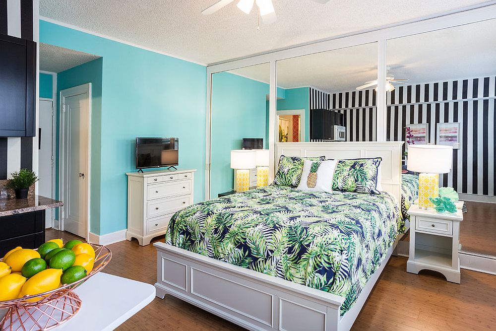 Blue and white tropical style bedroom with palm beach pattern bedding