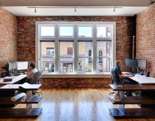 Century-Old Building Altered into Multi-Level Modern Industrial Office