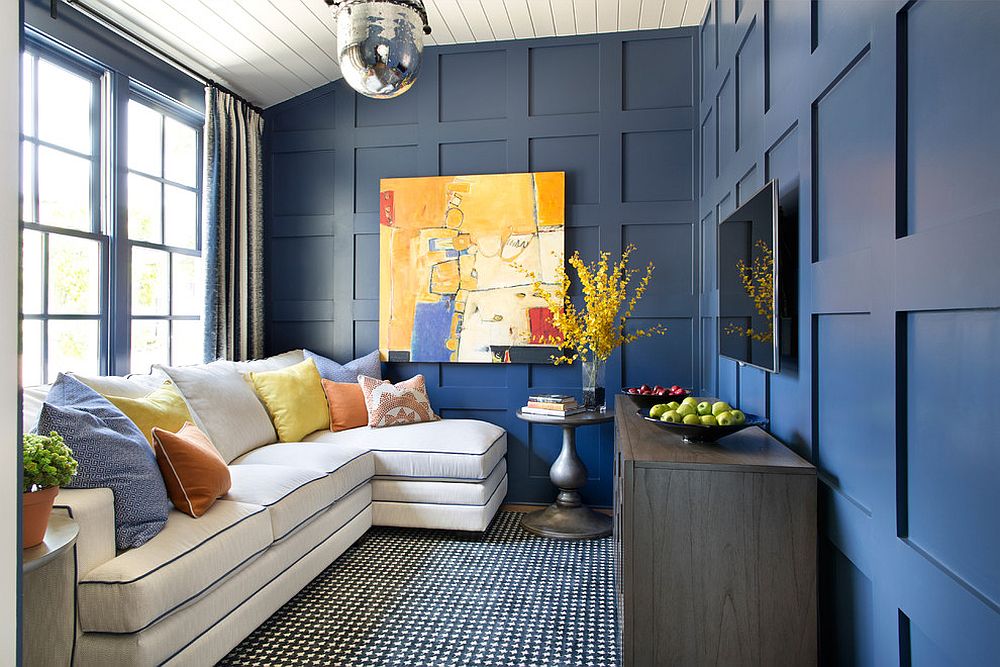 Carefully-placed-pops-of-yellow-in-a-bright-blue-room