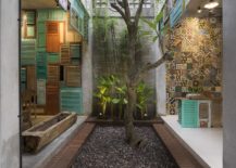 Central-yard-of-the-Indonesian-home-with-vintage-wooden-elements-217x155