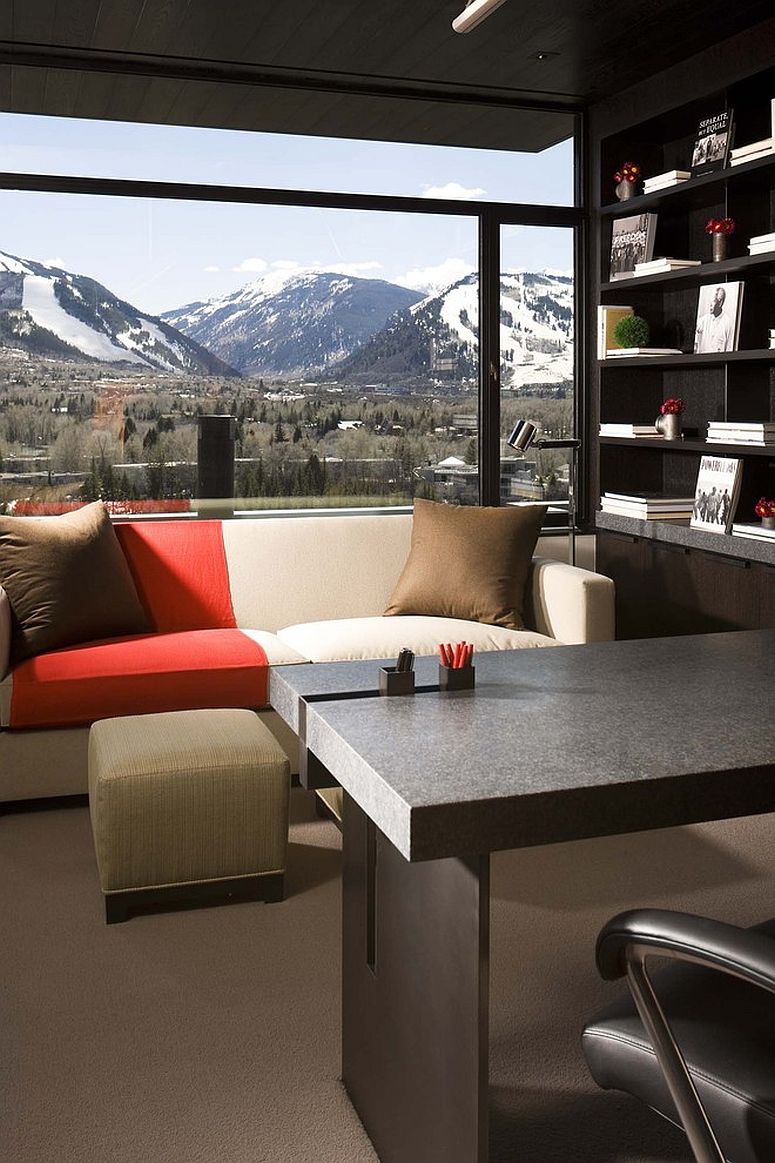 Dark-contemporary-home-office-with-spectacular-snow-covered-mountains-in-the-distance