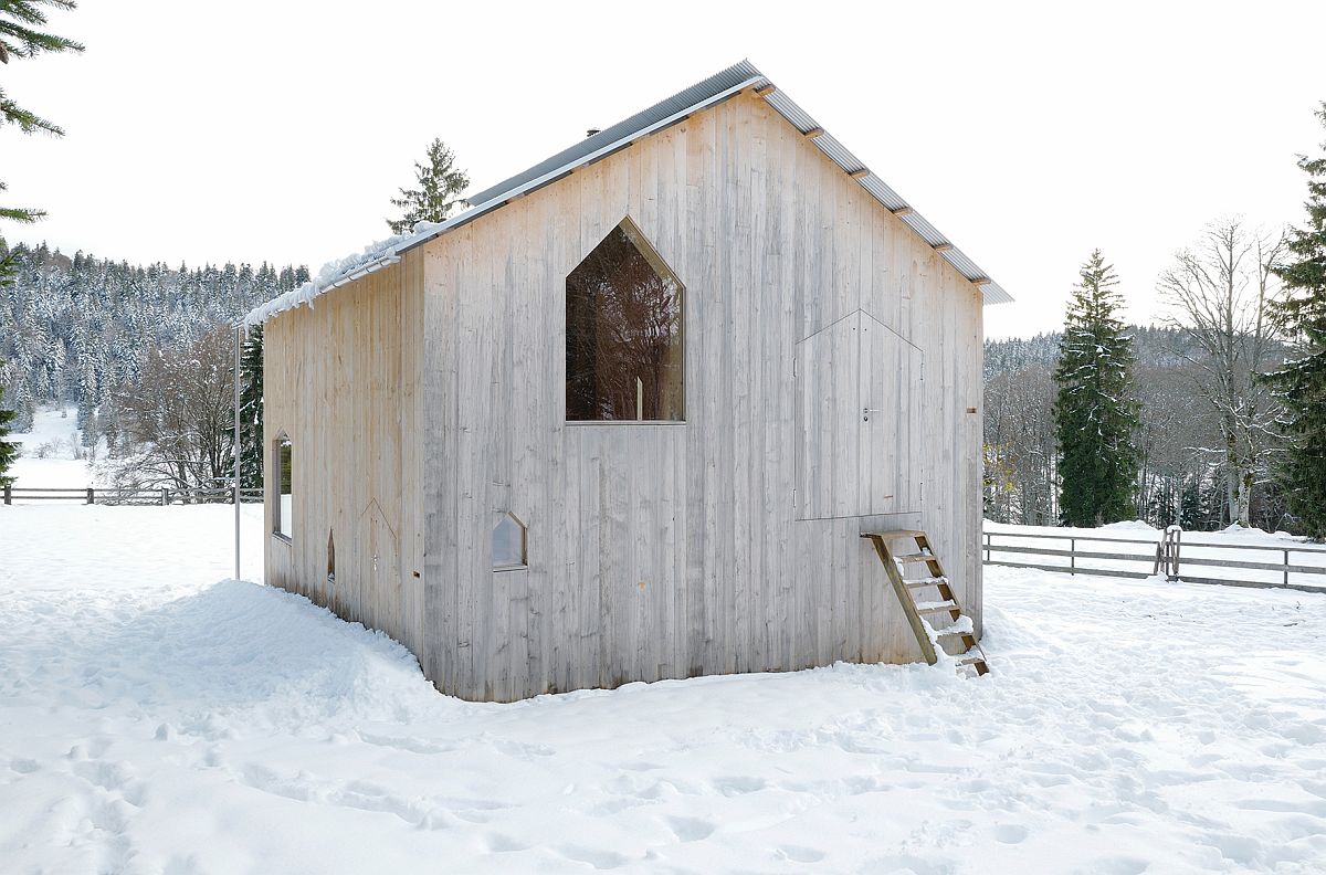 Delightfully minimal and whisical design of the wooden Switzerland cabin