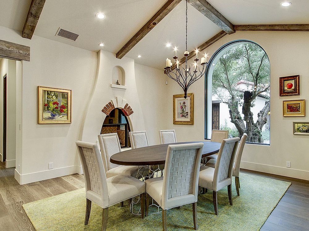 Exposed ceiling beams, archways and smart lighting for the modern Mediterranean dining room