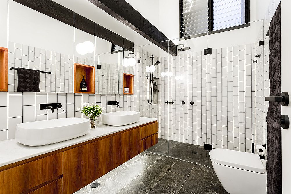 Floating wooden vanity for the black and white bathroom