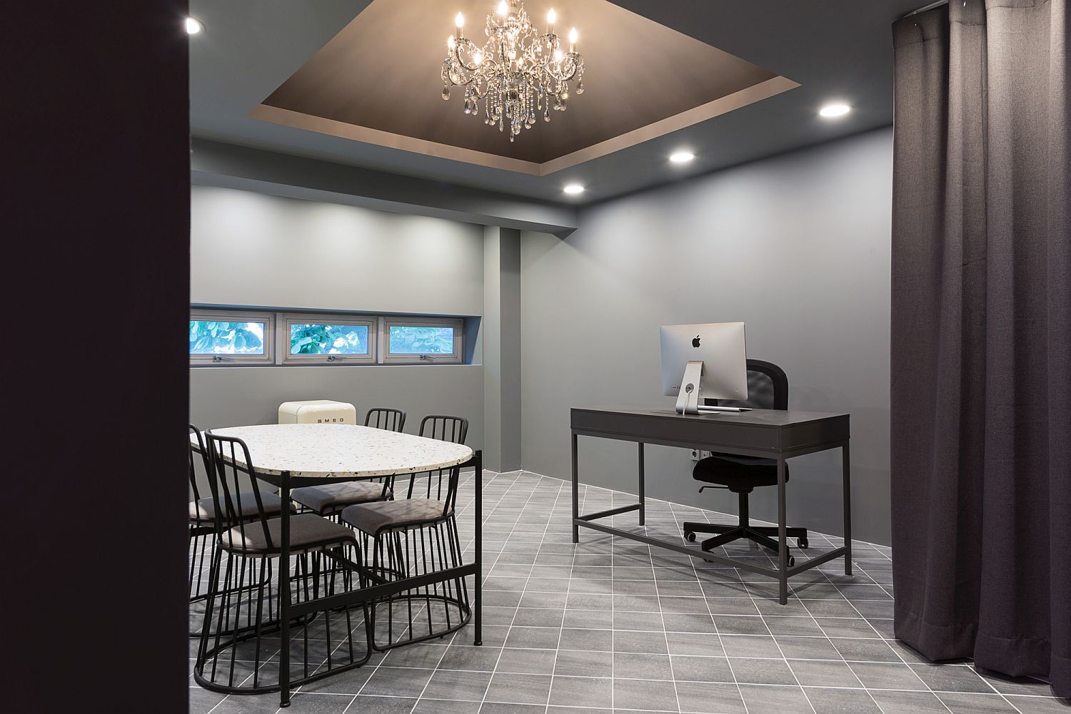 Gorgeous-gray-office-with-a-sparkling-chandelier