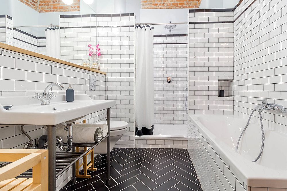 Herringbone pattern floor for the bathroom with a dash of brick magic above