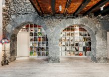 Historic-stone-walls-inside-the-house-combined-with-modern-bookshelves-217x155