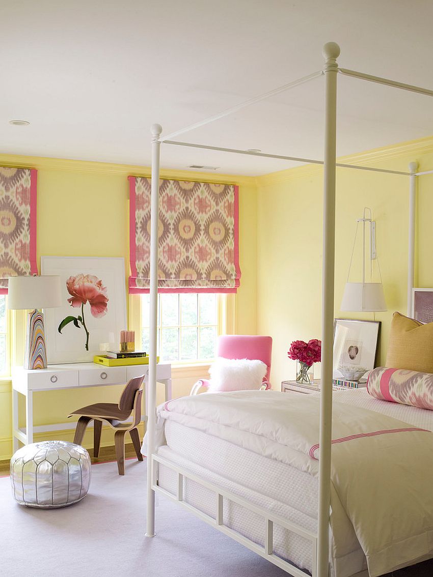 Light-filled contemporary bedroom in yellow with pink accents