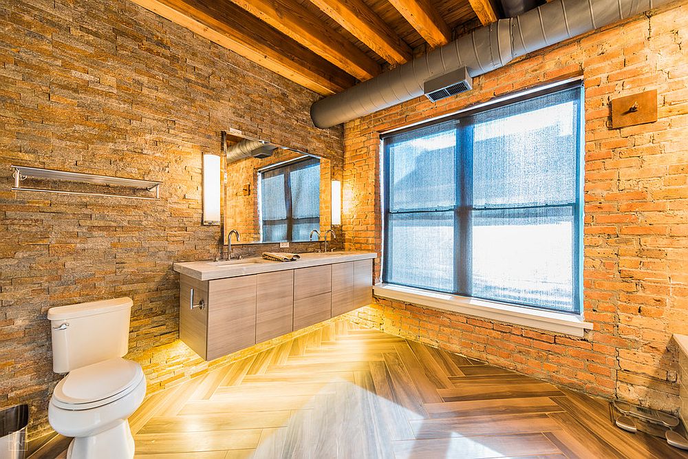 Modern industrial bathroom with gorgeous brick walls