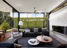 New-living-area-with-glass-walls-and-sliding-glass-doors-completly-opens-up-to-the-rear-garden-217x155