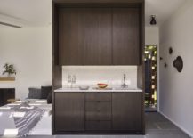 Small-bedroom-kitchenette-and-social-zone-inside-the-pool-house-217x155