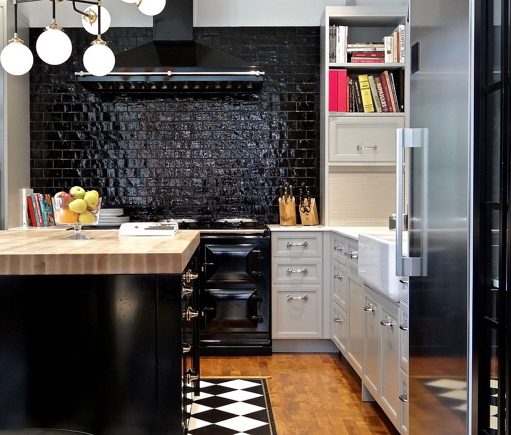 Small-kitchen-with-glossy-brick-wall-backdrop-and-island-in-black