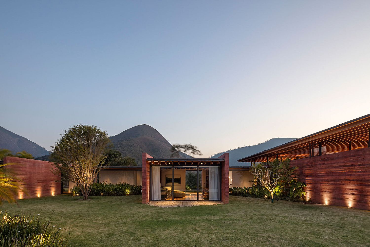 Smart lighting and modern garden around the contemporary Brazilian home