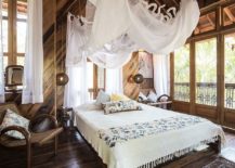 Wood-and-white-tropical-style-bedroom-with-a-beautiful-balcony-217x155