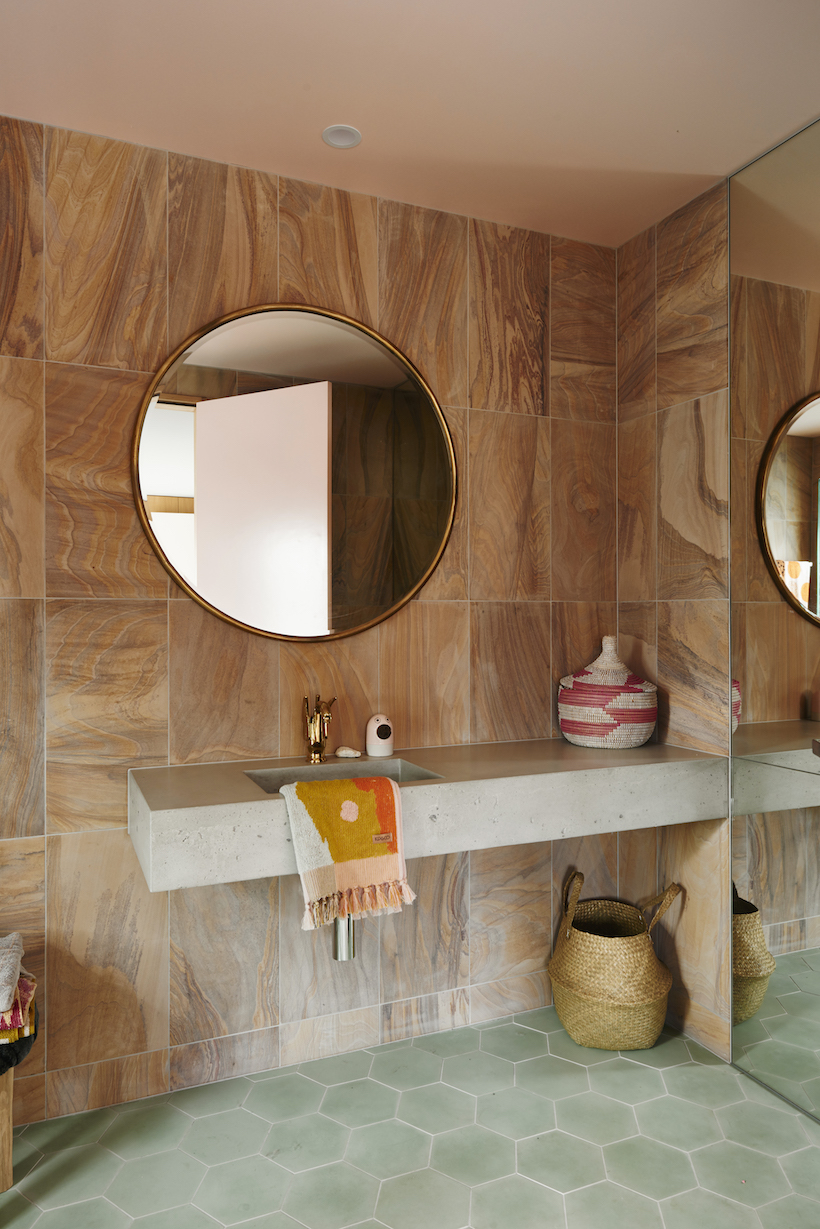 Baskets add function and style to a powder room