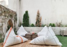 Bean-bags-and-wooden-crates-turn-the-outdoor-deck-into-a-cozy-hangout-217x155