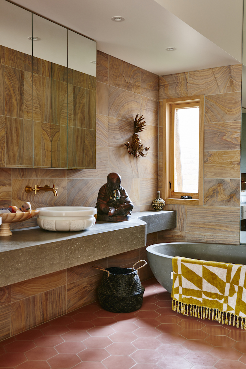 Black belly basket in a chic bathroom