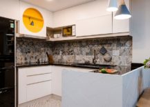 Bright-tiles-and-pops-of-yellow-and-blue-for-the-small-kitchen-in-white-217x155