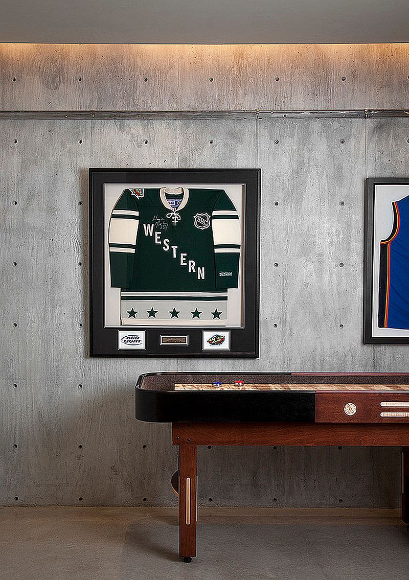 Concrete-wall-for-the-sports-themed-media-room
